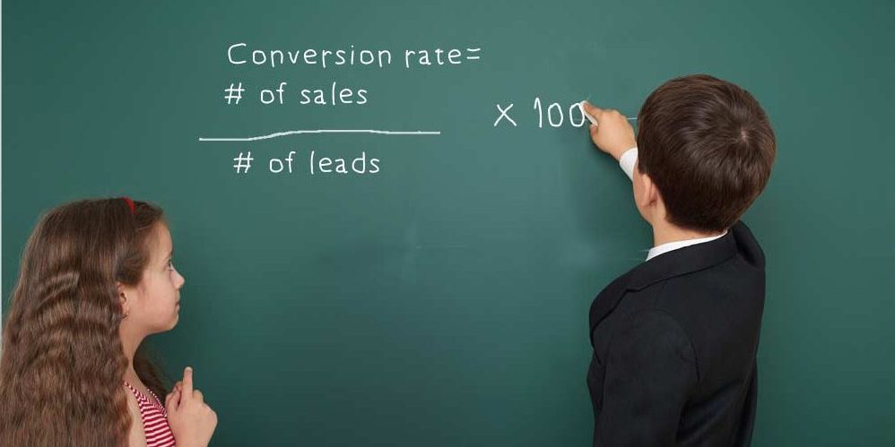 To young students working out the conversion equation on a blackboard.